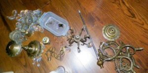 Chandelier being turned into bird feeder.